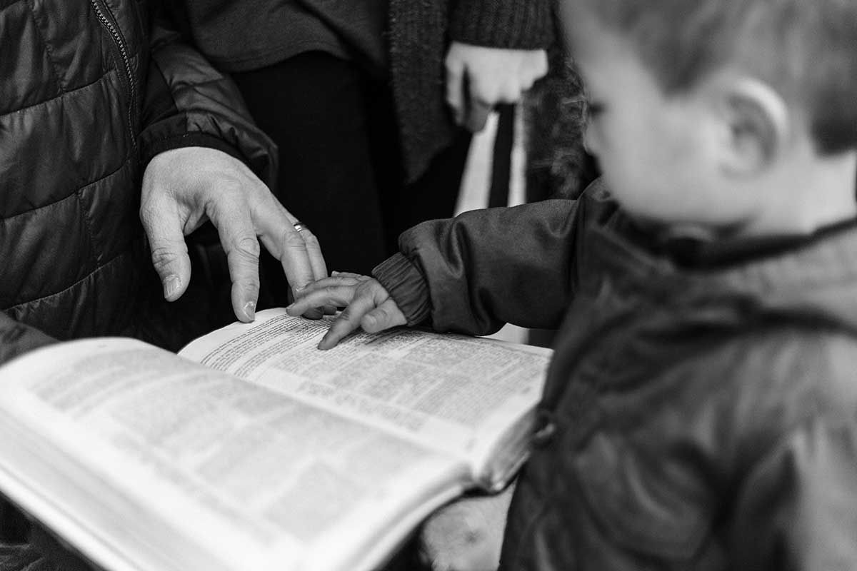 A child reading the Bible